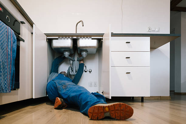Professional Drain Cleaning technician working in Bayville, NY